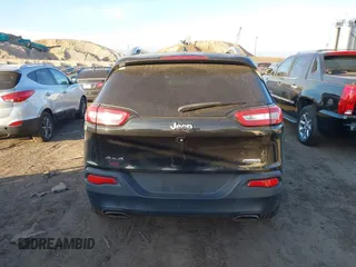 2015 Jeep Cherokee Latitude with VIN 1C4PJMCS0FW745949, listed as a IAAI auction lot 41289847 with 137,440 mi miles and . Bid and sale history available at carsss.com. Image 16.