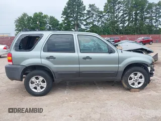 2006 Ford Escape XLT with VIN 1FMYU03146KD35945, listed as a IAAI auction lot 42337712 with 159,833 mi miles and . Bid and sale history available at DreamBid. Image 14.