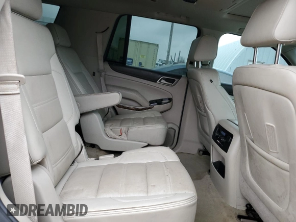 2015 GMC Yukon Denali with VIN 1GKS1CKJ1FR619793, listed as a Copart auction lot 86910314 with 128,559 mi miles and Salvage Title. Bid and sale history available at carsss.com. Image 11.