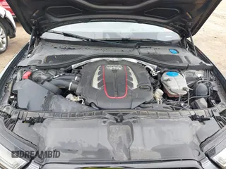 2016 Audi S6 Prestige z VIN WAUH2AFC1GN016187, wystawiony jako IAAI lot #42274744 z przebiegiem 169 821 mil mil oraz . Historia ofert i sprzedaży dostępna na DreamBid. Obrazek 10.