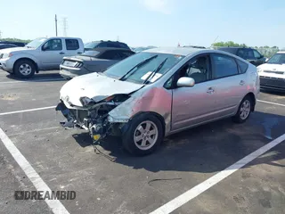 2005 Toyota Prius with VIN JTDKB20U950122932, listed as a IAAI auction lot 42026279 with 153,006 mi miles. Bid and sale history available at carsss.com. Image 2.