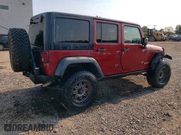 2013 Jeep Wrangler Unlimited Rubicon 10th Anniversary z VIN 1C4HJWFG2DL572943, wystawiony jako Copart lot #80610363 z przebiegiem 88 296 mil mil oraz Szkoda całkowita • Salvage title. Historia ofert i sprzedaży dostępna na DreamBid. Obrazek 3.