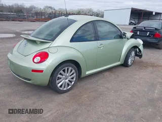 2008 Volkswagen New Beetle Coupe S with VIN 3VWRW31C38M523065, listed as a IAAI auction lot 41802540 with 151,065 mi miles. Bid and sale history available at carsss.com. Image 4.