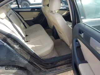 2016 Volkswagen Jetta Sedan 1.4T SE with VIN 3VWD67AJ3GM390273, listed as a IAAI auction lot 41575074 with 114,705 mi miles. Bid and sale history available at carsss.com. Image 8.