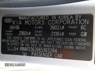 2006 Kia Spectra with VIN KNAFE162665365284, listed as a Copart auction lot 52147085 with 139,570 mi miles and Salvage Title. Bid and sale history available at carsss.com. Image 12.