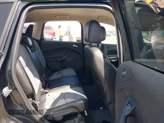 2017 Ford Escape SE with VIN 1FMCU0G9XHUE37185, listed as a IAAI auction lot 42053979 with 72,904 mi miles. Bid and sale history available at carsss.com. Image 8.