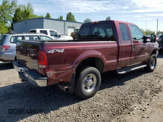2004 Ford F-250 XL with VIN 1FTNX21P64EB90565, listed as a Copart auction lot 59022005 with 223,577 mi miles and Salvage title. Bid and sale history available at DreamBid. Image 3.