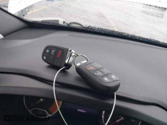 2020 Jeep Renegade Limited with VIN ZACNJBD12LPL42952, listed as a IAAI auction lot 42361858 with 54,058 mi miles and . Bid and sale history available at DreamBid. Image 11.