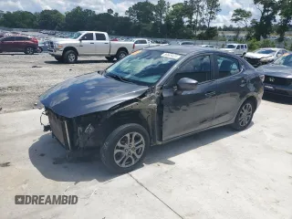 2019 Toyota Yaris L z VIN 3MYDLBYV9KY520180, wystawiony jako Copart lot #56649425 z przebiegiem 132 050 mil mil oraz Szkoda całkowita • Salvage title. Historia ofert i sprzedaży dostępna na DreamBid. Obrazek 1.
