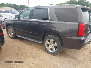 2016 Chevrolet Tahoe LTZ z VIN 1GNSKCKC3GR112445, wystawiony jako IAAI lot #42312996 z przebiegiem 107 511 mil mil oraz . Historia ofert i sprzedaży dostępna na DreamBid. Obrazek 3.