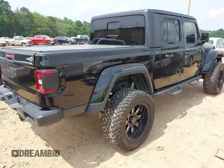 2021 Jeep Gladiator Willys with VIN 1C6HJTAG7ML514114, listed as a IAAI auction lot 42399793 with 78,829 mi miles and . Bid and sale history available at DreamBid. Image 4.