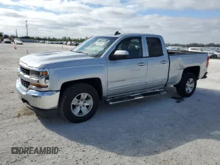 2018 Chevrolet Silverado 1500 LT with VIN 1GCRCREH4JZ159330, listed as a Copart auction lot 87587095 with 173,986 mi miles and Salvage Title. Bid and sale history available at DreamBid. Image 1.