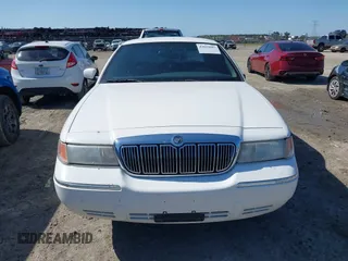 2000 Mercury Grand Marquis LS z VIN 2MEFM75W3YX689323, wystawiony jako IAAI lot #42019687 z przebiegiem 241 045 mil mil oraz . Historia ofert i sprzedaży dostępna na DreamBid. Obrazek 12.