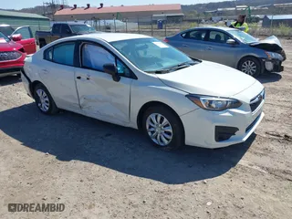 2018 Subaru Impreza with VIN 4S3GKAA6XJ3613244, listed as a IAAI auction lot 42036955 with 77,272 mi miles. Bid and sale history available at carsss.com. Image 1.
