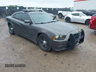 2013 Dodge Charger Police z VIN 2C3CDXAT4DH521778, wystawiony jako IAAI lot #42169438 z przebiegiem 191 907 mil mil oraz . Historia ofert i sprzedaży dostępna na DreamBid. Obrazek 1.
