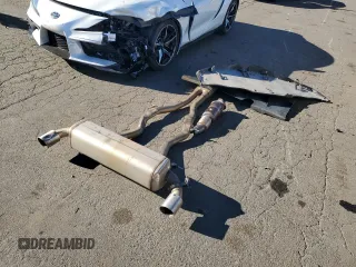 2021 Toyota Supra 3.0 с VIN WZ1DB0C02MW042827, выставлен на аукционе Copart как лот 81323404 с пробегом 35 466 миль миль и Списание • Salvage title. История ставок и продаж доступна на DreamBid. Изображение 14.