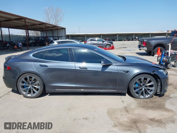 2017 Tesla Model S 100D with VIN 5YJSA1E29HF204881, listed as a IAAI auction lot 41785767 with 146,523 mi miles and . Bid and sale history available at DreamBid. Image 13.