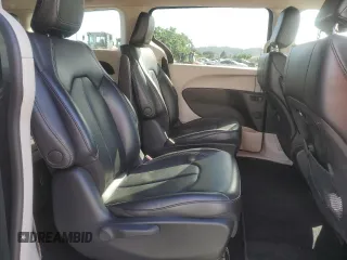 2023 Chrysler Pacifica Hybrid Touring L with VIN 2C4RC1L79PR608659, listed as a Copart auction lot 56945365 with 45,697 mi miles and Salvage title. Bid and sale history available at DreamBid. Image 11.