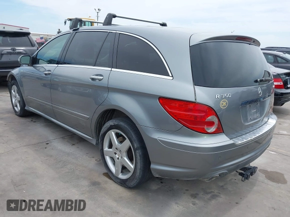 2010 Mercedes-Benz R 350 with VIN 4JGCB6FE2AA111332, listed as a IAAI auction lot 42043115 with 159,760 mi miles and . Bid and sale history available at DreamBid. Image 3.