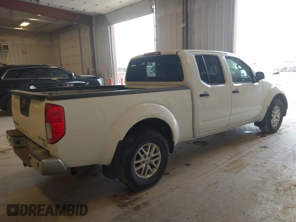 2018 Nissan Frontier SV z VIN 1N6DD0FV7JN718221, wystawiony jako IAAI lot #42118492 z przebiegiem 132 413 mil mil oraz . Historia ofert i sprzedaży dostępna na DreamBid. Obrazek 4.