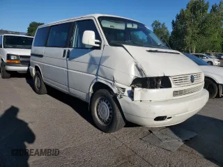 2003 Volkswagen EuroVan MV с VIN WV2MB47053H012029, выставлен на аукционе Copart как лот 68222234 с пробегом 247 494 миль миль и Списание • Salvage title. История ставок и продаж доступна на DreamBid. Изображение 4.