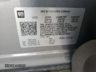 2023 Buick Encore GX Select with VIN KL4MMDS29PB137250, listed as a Copart auction lot 57261485 with 6,307 mi miles and Salvage title. Bid and sale history available at DreamBid. Image 13.