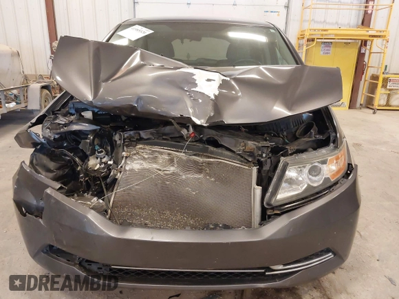 2016 Honda Odyssey SE with VIN 5FNRL5H38GB039652, listed as a IAAI auction lot 41985520 with Not Provided miles and . Bid and sale history available at DreamBid. Image 6.