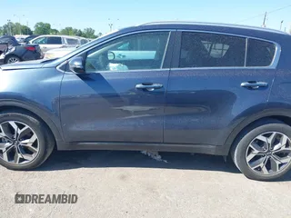 2021 Kia Sportage EX with VIN KNDPN3AC1M7889706, listed as a IAAI auction lot 41948559 with 52,329 mi miles and . Bid and sale history available at DreamBid. Image 13.