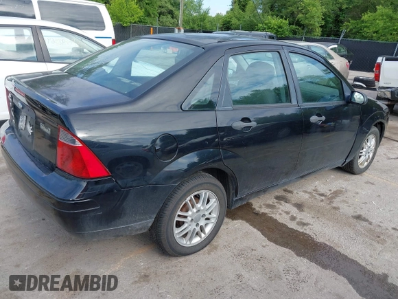 2007 Ford Focus S z VIN 1FAHP34N37W161610, wystawiony jako IAAI lot #42370742 z przebiegiem Nie podano mil oraz . Historia ofert i sprzedaży dostępna na DreamBid. Obrazek 4.