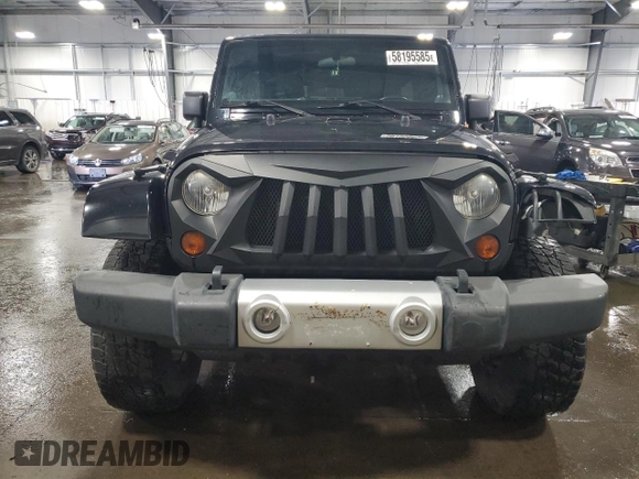 2012 Jeep Wrangler Unlimited Sahara with VIN 1C4BJWEG8CL235893, listed as a Copart auction lot 58195585 with 142,179 mi miles and Salvage title. Bid and sale history available at DreamBid. Image 5.