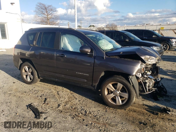2015 Jeep Compass High Altitude Edition with VIN 1C4NJDEB8FD395566, listed as a Copart auction lot 86682874 with 198,560 mi miles and Salvage Title. Bid and sale history available at carsss.com. Image 4.