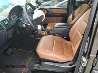 2004 Mercedes-Benz G with VIN WDCYR46E74X144672, listed as a Copart auction lot 55212454 with 143,994 mi miles and Salvage Title. Bid and sale history available at DreamBid. Image 7.