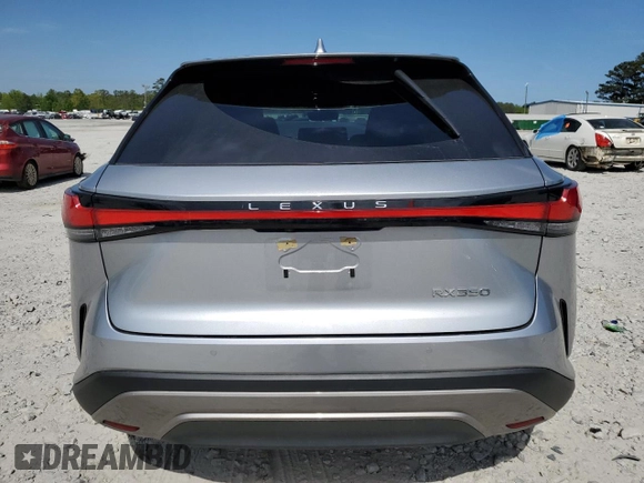 2024 Lexus RX 350 z VIN 2T2BAMBA6RC038088, wystawiony jako Copart lot #53776565 z przebiegiem 18 548 mil mil oraz Szkoda całkowita • Salvage title. Historia ofert i sprzedaży dostępna na DreamBid. Obrazek 6.