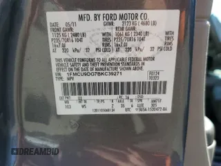 2011 Ford Escape XLT z VIN 1FMCU9DG7BKC39271, wystawiony jako Copart lot #55880445 z przebiegiem 202 072 mil mil oraz Szkoda całkowita • Salvage title. Historia ofert i sprzedaży dostępna na DreamBid. Obrazek 13.