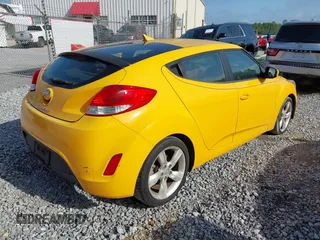 2012 Hyundai Veloster w/Gray Int with VIN KMHTC6AD2CU079902, listed as a IAAI auction lot 42088473 with 143,983 mi miles. Bid and sale history available at carsss.com. Image 4.