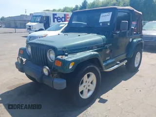 2000 Jeep Wrangler Sahara с VIN 1J4FA59S0YP748057, выставлен на аукционе IAAI как лот 42420342 с пробегом 195 963 миль миль и . История ставок и продаж доступна на DreamBid. Изображение 2.