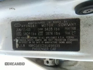 2004 Hyundai Accent GL with VIN KMHCG45C04U498939, listed as a IAAI auction lot 41384821 with 247,994 mi miles. Bid and sale history available at carsss.com. Image 9.