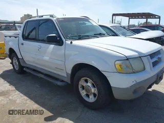 2002 Ford Explorer Sport Trac Value z VIN 1FMZU67E92UB80098, wystawiony jako IAAI lot #42090531 z przebiegiem 214 474 mil mil oraz . Historia ofert i sprzedaży dostępna na DreamBid. Obrazek 1.