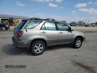 1999 Lexus RX 300 with VIN JT6HF10UXX0018047, listed as a Copart auction lot 52810725 with 211,803 mi miles and Clean Title. Bid and sale history available at DreamBid. Image 3.