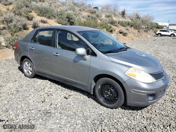 2007 Nissan Versa 1.8 S with VIN 3N1BC11E17L446450, listed as a Copart auction lot 52631415 with 121,006 mi miles and Salvage Title. Bid and sale history available at carsss.com. Image 4.