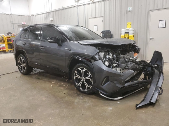 2022 Toyota RAV4 Prime XSE with VIN JTMFB3FVXND097412, listed as a Copart auction lot 82444154 with NaN miles and Salvage Title. Bid and sale history available at carsss.com. Image 4.