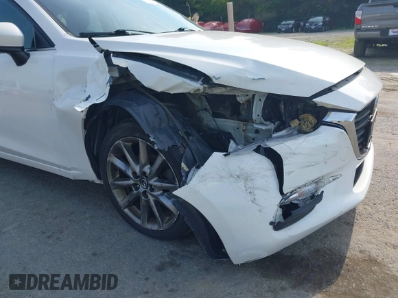 2018 Mazda 3 Touring z VIN 3MZBN1L35JM210093, wystawiony jako IAAI lot #39810891 z przebiegiem 110 052 mil mil oraz . Historia ofert i sprzedaży dostępna na DreamBid. Obrazek 6.