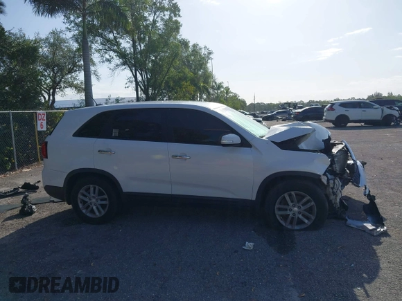 2015 Kia Sorento LX with VIN 5XYKT3A61FG561833, listed as a IAAI auction lot 42016426 with 130,907 mi miles and . Bid and sale history available at carsss.com. Image 13.