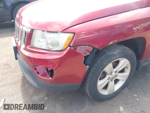 2011 Jeep Compass Latitude with VIN 1J4NT1FB8BD170401, listed as a IAAI auction lot 42094953 with 122,617 mi miles. Bid and sale history available at carsss.com. Image 6.