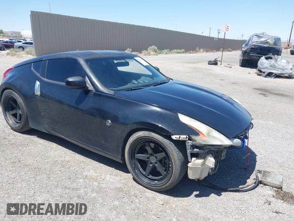 2013 Nissan 370Z z VIN JN1AZ4EH8DM880849, wystawiony jako IAAI lot #42131189 z przebiegiem Nie podano mil oraz . Historia ofert i sprzedaży dostępna na DreamBid. Obrazek 1.