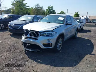 2018 BMW X6 xDrive35i z VIN 5UXKU2C51J0X50507, wystawiony jako IAAI lot #40275236 z przebiegiem 67 523 mil mil oraz . Historia ofert i sprzedaży dostępna na DreamBid. Obrazek 17.