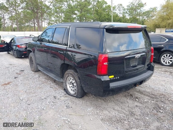2015 Chevrolet Tahoe LT with VIN 1GNSCBKCXFR687597, listed as a IAAI auction lot 41935279 with 213,290 mi miles. Bid and sale history available at carsss.com. Image 3.