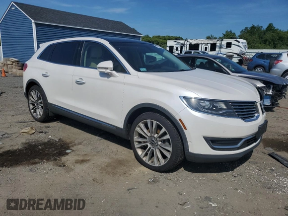 2016 Lincoln MKX Reserve with VIN 2LMTJ8LPXGBL38015, listed as a Copart auction lot 60981375 with 101,589 mi miles and Salvage title. Bid and sale history available at DreamBid. Image 4.