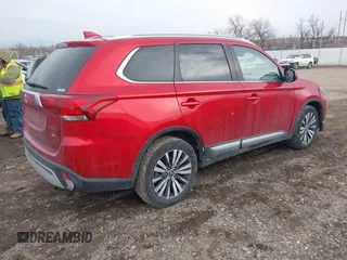 2020 Mitsubishi Outlander ES z VIN JA4AZ3A38LZ020558, wystawiony jako IAAI lot #41694744 z przebiegiem 100 886 mil mil oraz . Historia ofert i sprzedaży dostępna na DreamBid. Obrazek 4.