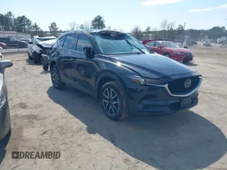 2017 Mazda CX-5 Grand Touring with VIN JM3KFADL4H0115074, listed as a IAAI auction lot 41913389 with 1 mi miles. Bid and sale history available at carsss.com. Image 1.